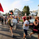 Detroit City FC's Northern Guard marches half a mile through Hamtramck to Keyworth Stadium on match days. 